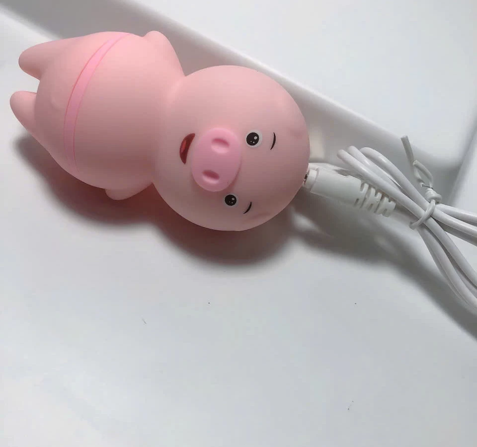 M&aacute;y liếm hạt le, đầu ti h&igrave;nh ch&uacute; heo ngộ nghĩnh